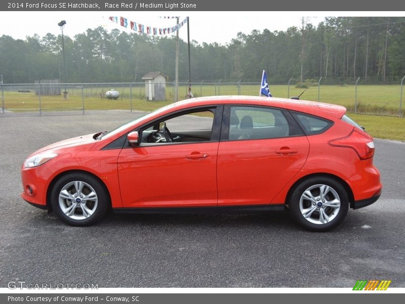 Race Red / Medium Light Stone 2014 Ford Focus SE Hatchback