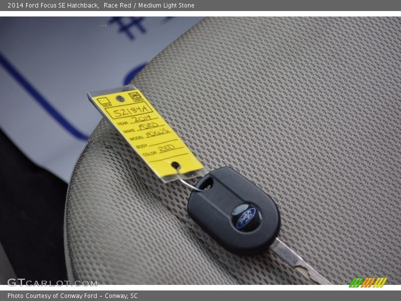 Race Red / Medium Light Stone 2014 Ford Focus SE Hatchback