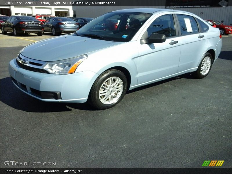 Light Ice Blue Metallic / Medium Stone 2009 Ford Focus SE Sedan