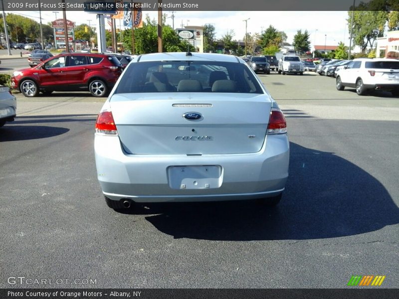 Light Ice Blue Metallic / Medium Stone 2009 Ford Focus SE Sedan