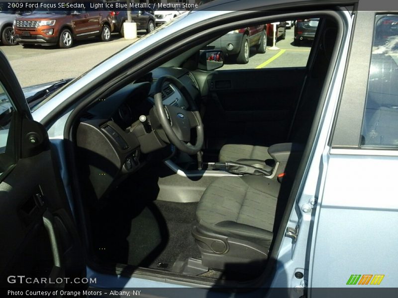 Light Ice Blue Metallic / Medium Stone 2009 Ford Focus SE Sedan