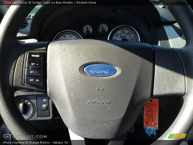 Light Ice Blue Metallic / Medium Stone 2009 Ford Focus SE Sedan