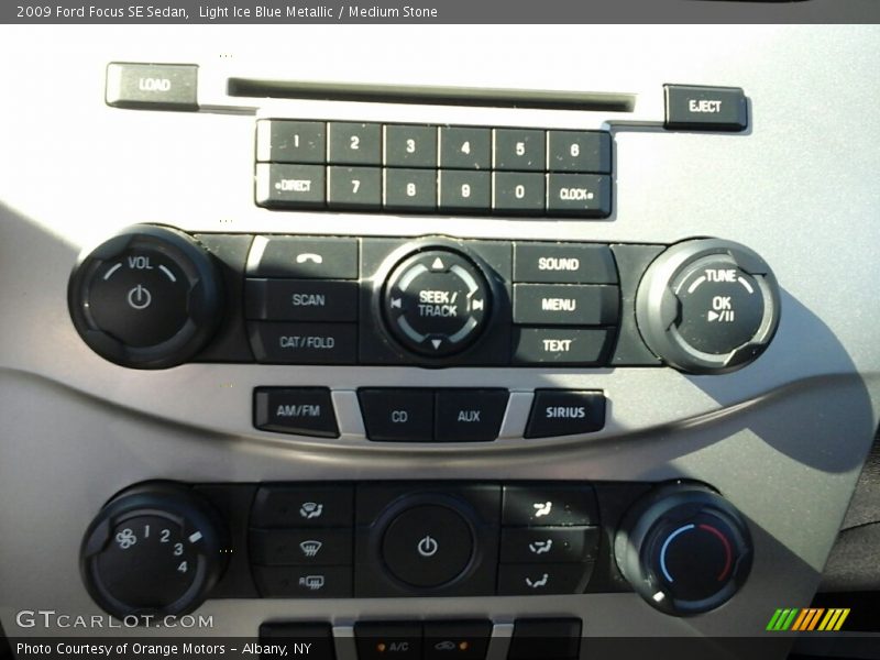 Light Ice Blue Metallic / Medium Stone 2009 Ford Focus SE Sedan