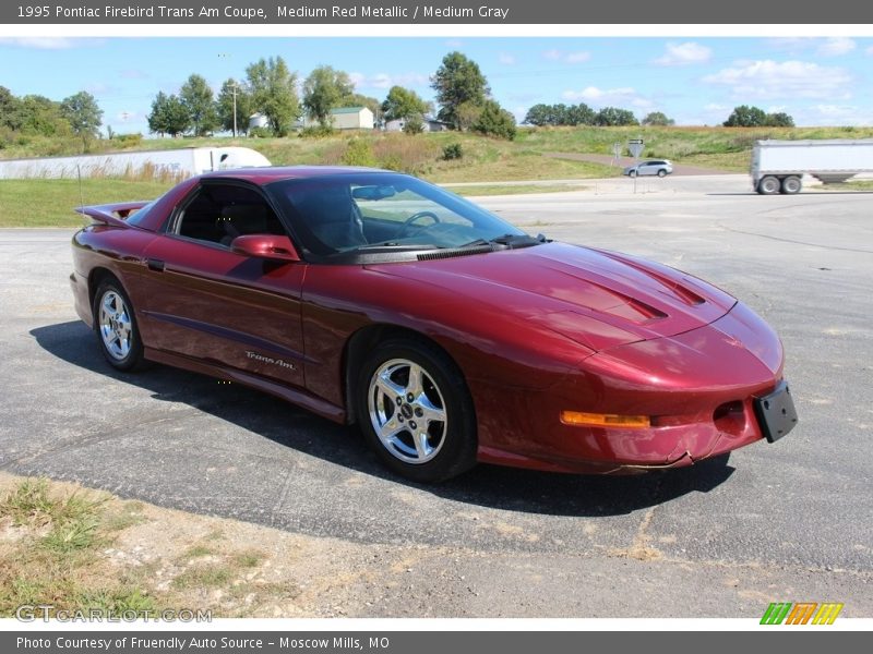 Medium Red Metallic / Medium Gray 1995 Pontiac Firebird Trans Am Coupe
