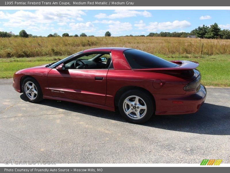 Medium Red Metallic / Medium Gray 1995 Pontiac Firebird Trans Am Coupe