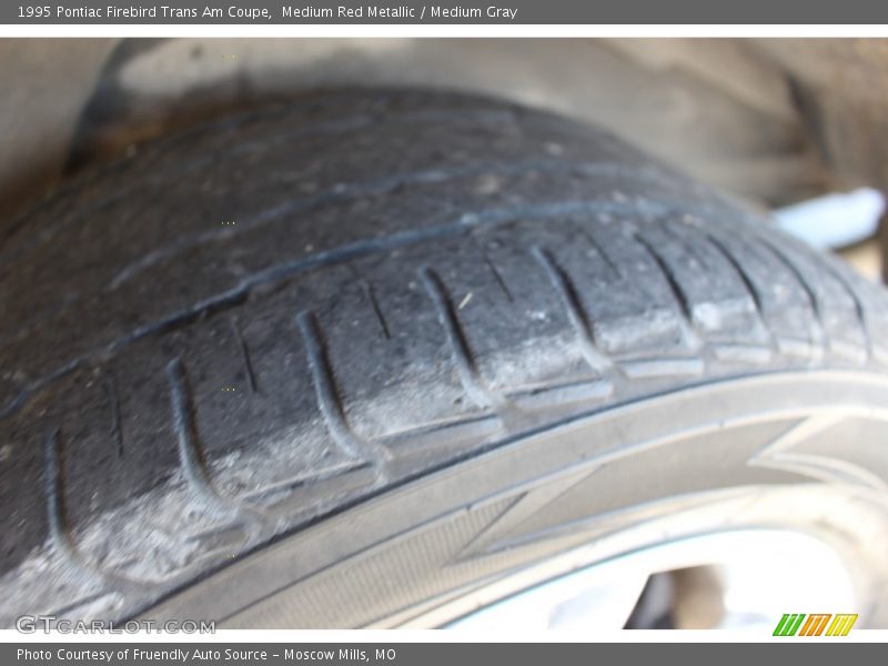 Medium Red Metallic / Medium Gray 1995 Pontiac Firebird Trans Am Coupe