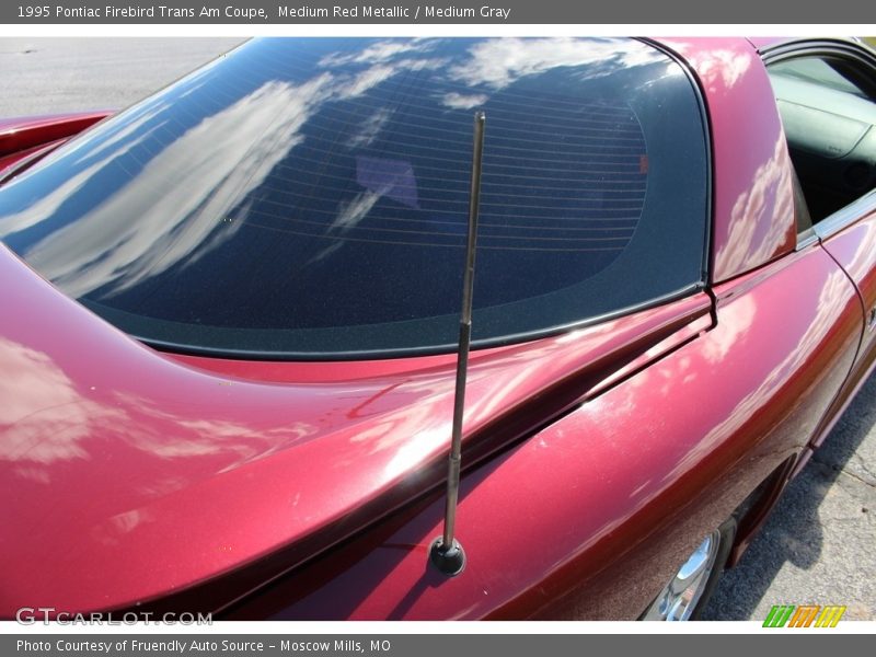 Medium Red Metallic / Medium Gray 1995 Pontiac Firebird Trans Am Coupe