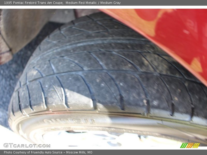 Medium Red Metallic / Medium Gray 1995 Pontiac Firebird Trans Am Coupe