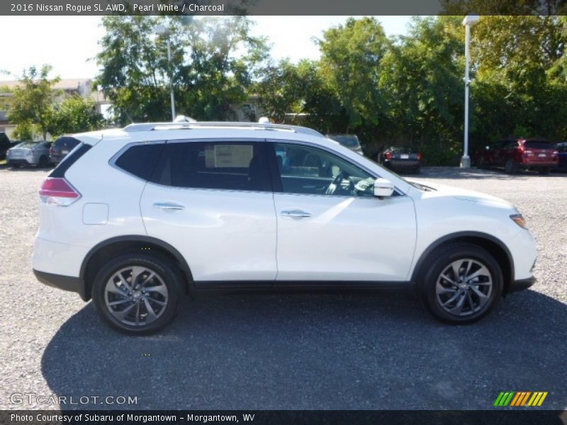 Pearl White / Charcoal 2016 Nissan Rogue SL AWD