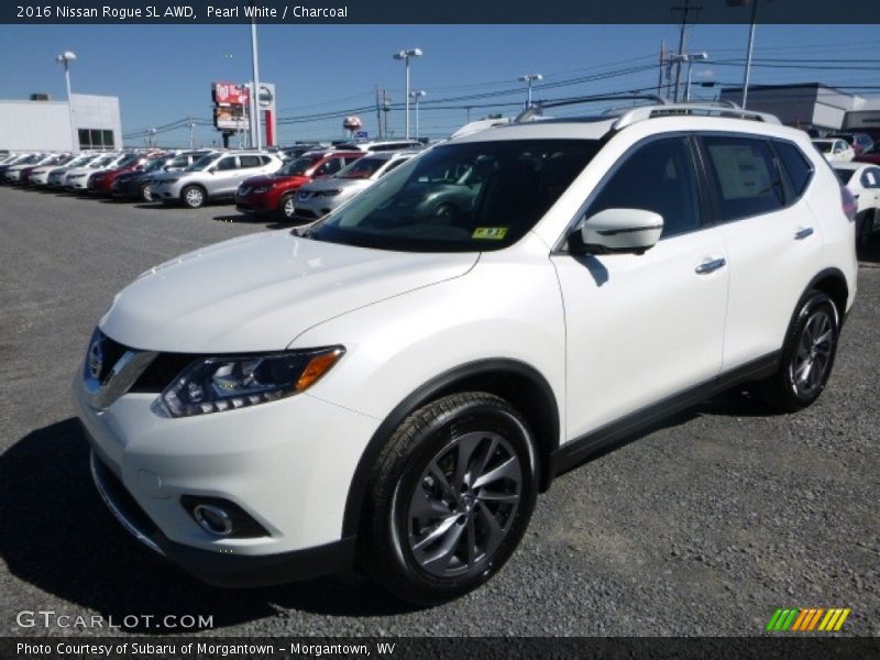 Pearl White / Charcoal 2016 Nissan Rogue SL AWD