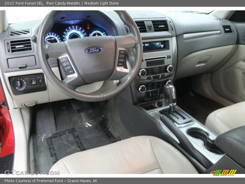 Red Candy Metallic / Medium Light Stone 2012 Ford Fusion SEL