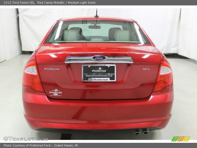 Red Candy Metallic / Medium Light Stone 2012 Ford Fusion SEL