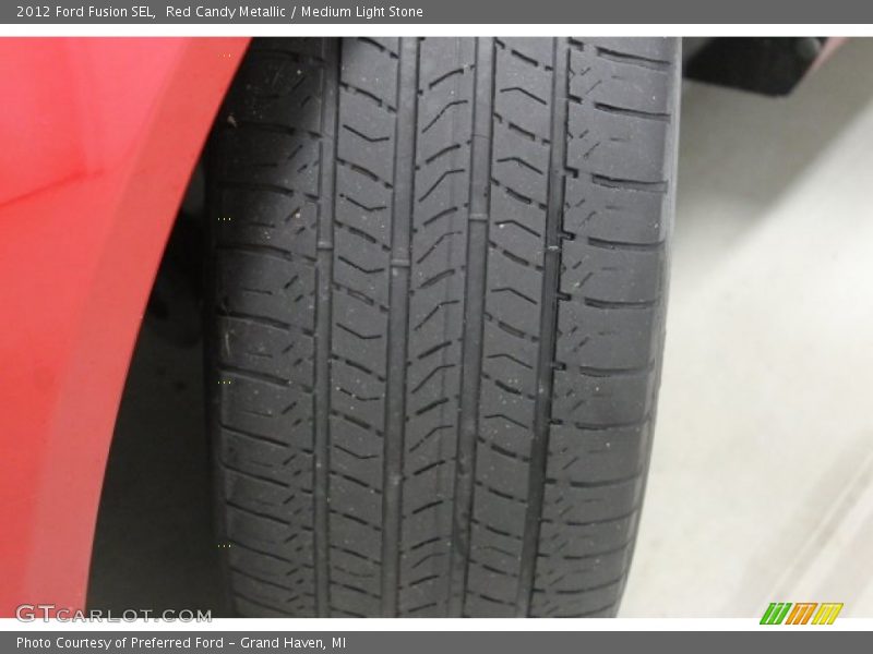 Red Candy Metallic / Medium Light Stone 2012 Ford Fusion SEL