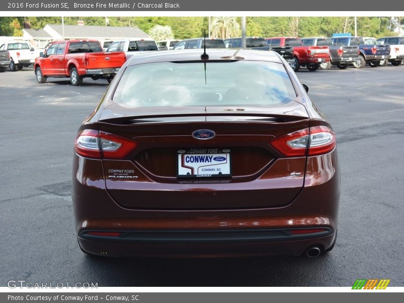 Bronze Fire Metallic / Charcoal Black 2016 Ford Fusion SE