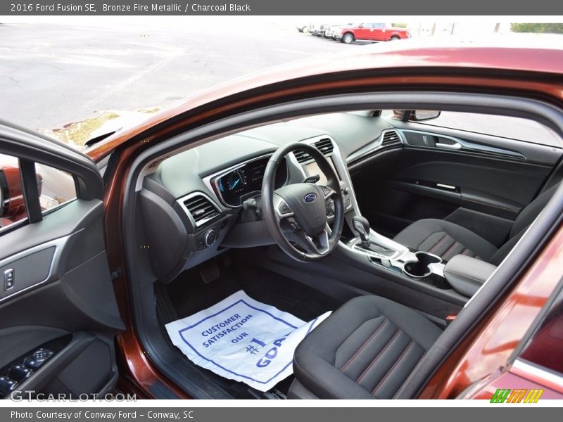 Bronze Fire Metallic / Charcoal Black 2016 Ford Fusion SE