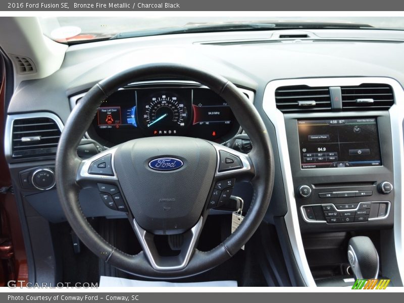 Bronze Fire Metallic / Charcoal Black 2016 Ford Fusion SE