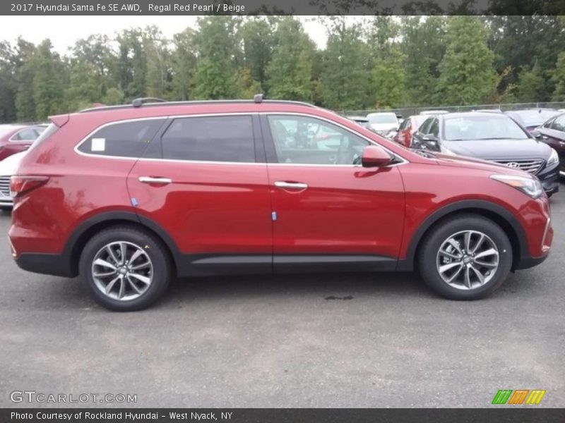 Regal Red Pearl / Beige 2017 Hyundai Santa Fe SE AWD