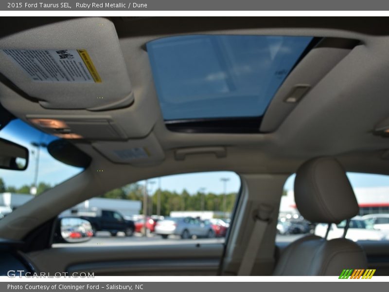 Ruby Red Metallic / Dune 2015 Ford Taurus SEL