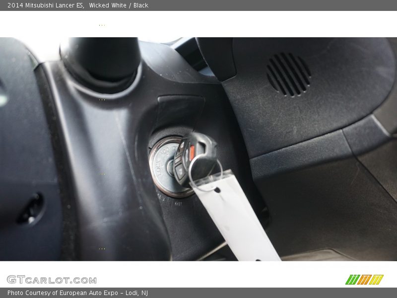 Wicked White / Black 2014 Mitsubishi Lancer ES