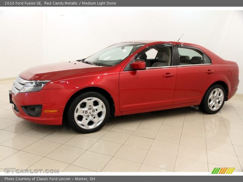 Red Candy Metallic / Medium Light Stone 2010 Ford Fusion SE