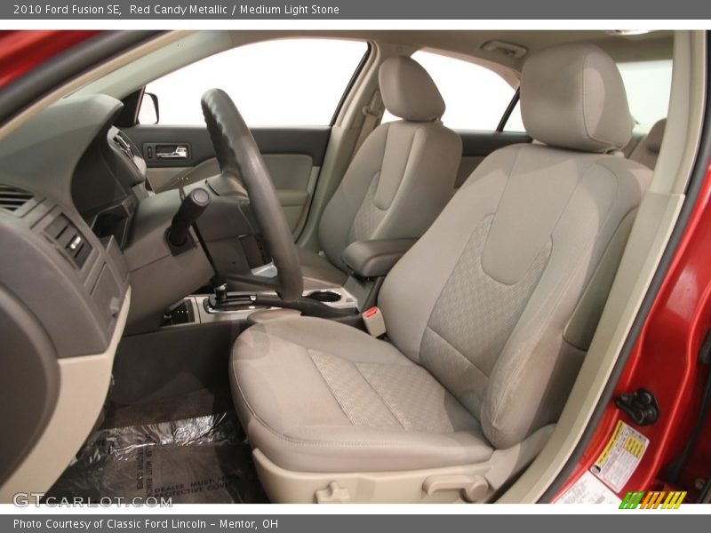 Red Candy Metallic / Medium Light Stone 2010 Ford Fusion SE