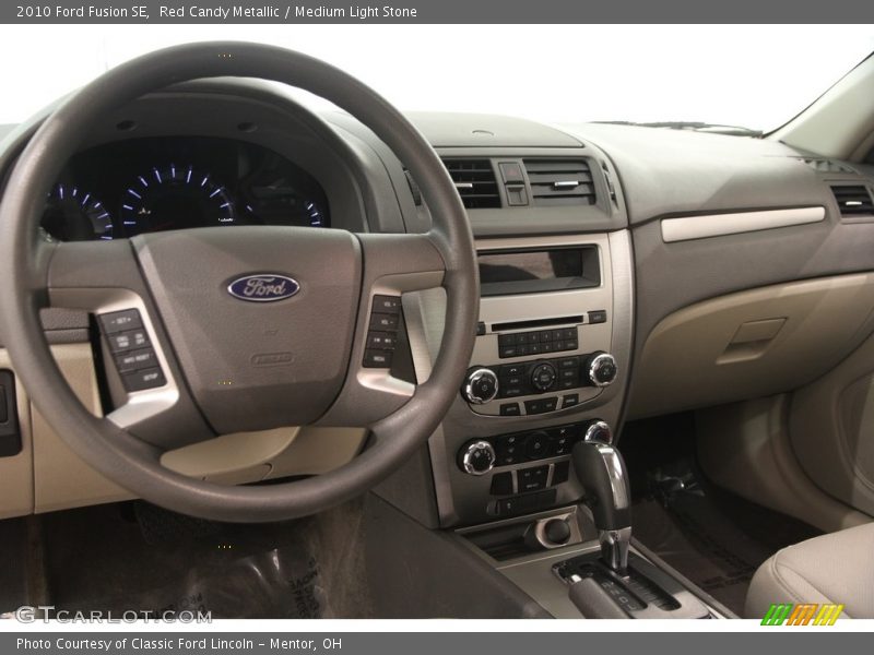 Red Candy Metallic / Medium Light Stone 2010 Ford Fusion SE