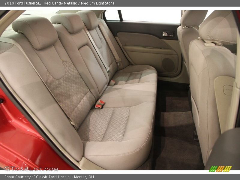 Red Candy Metallic / Medium Light Stone 2010 Ford Fusion SE