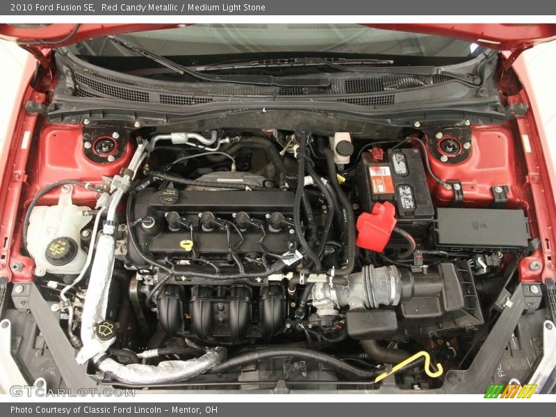 Red Candy Metallic / Medium Light Stone 2010 Ford Fusion SE