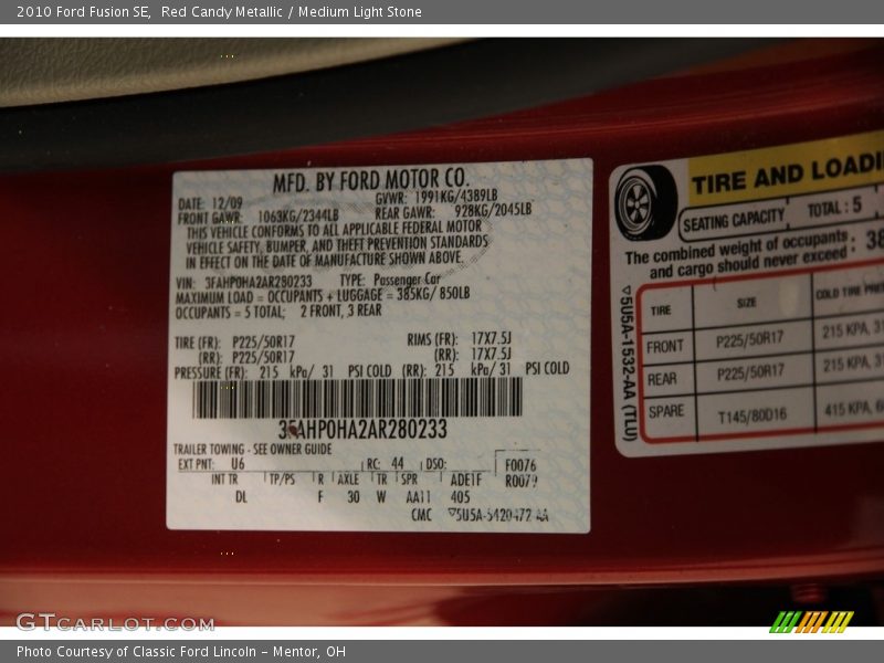 Red Candy Metallic / Medium Light Stone 2010 Ford Fusion SE