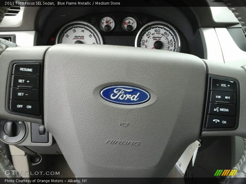 Blue Flame Metallic / Medium Stone 2011 Ford Focus SEL Sedan