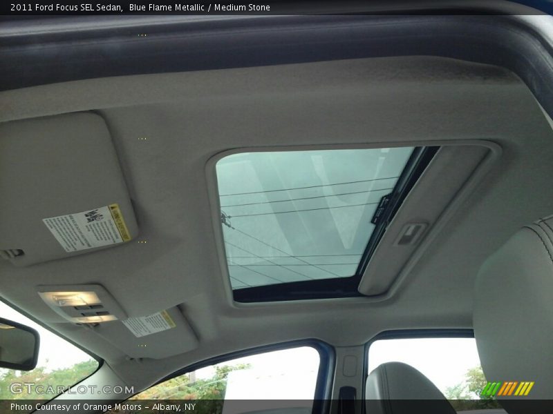 Blue Flame Metallic / Medium Stone 2011 Ford Focus SEL Sedan