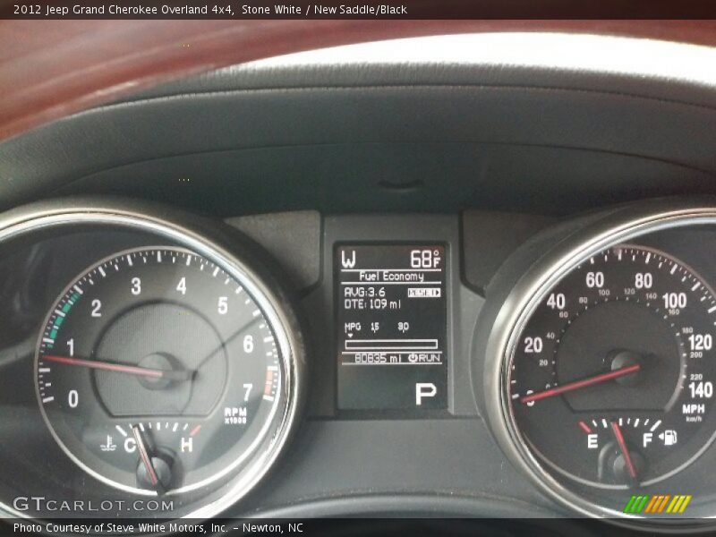 Stone White / New Saddle/Black 2012 Jeep Grand Cherokee Overland 4x4
