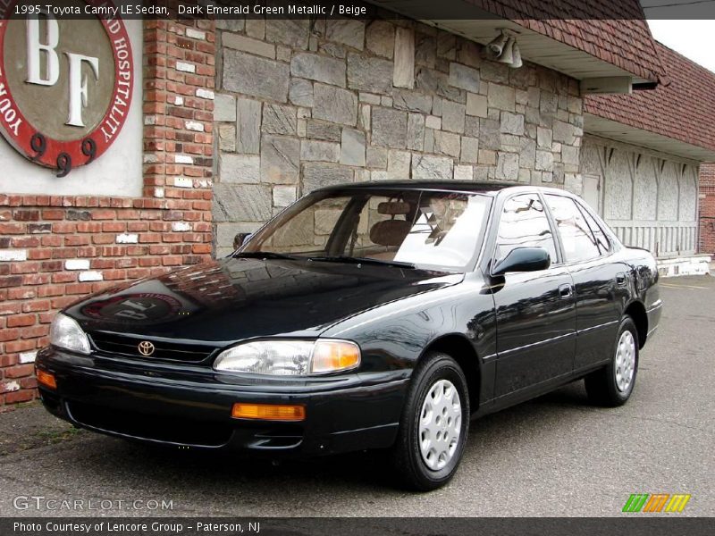 Dark Emerald Green Metallic / Beige 1995 Toyota Camry LE Sedan