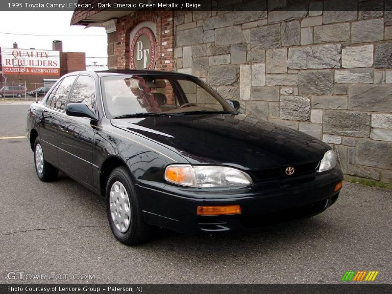 Dark Emerald Green Metallic / Beige 1995 Toyota Camry LE Sedan