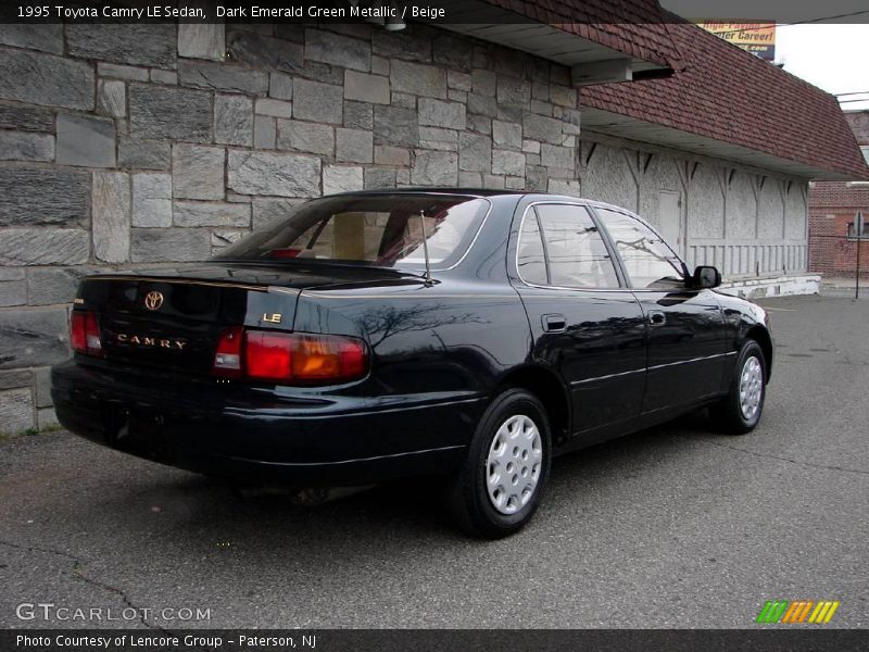 Dark Emerald Green Metallic / Beige 1995 Toyota Camry LE Sedan