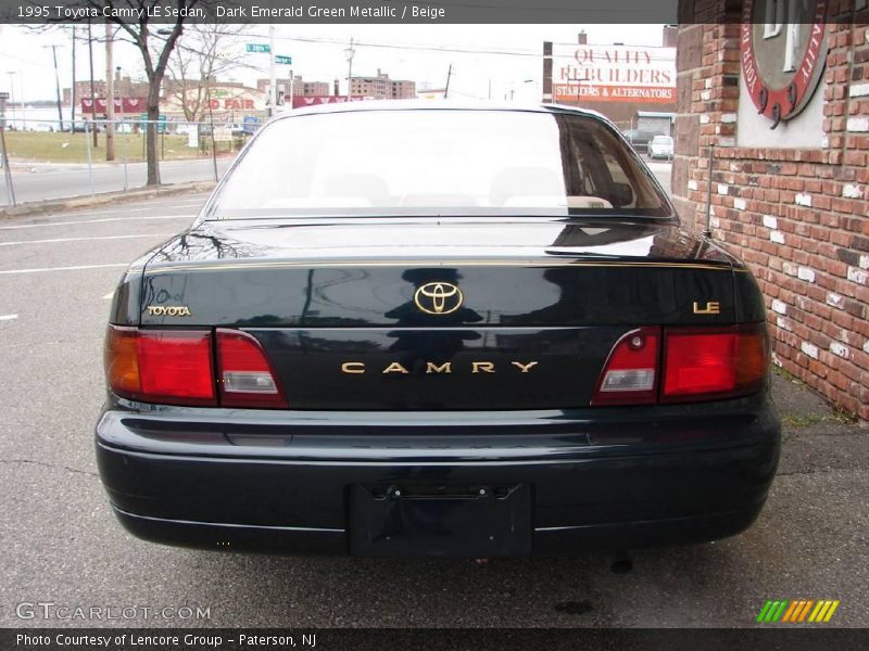 Dark Emerald Green Metallic / Beige 1995 Toyota Camry LE Sedan