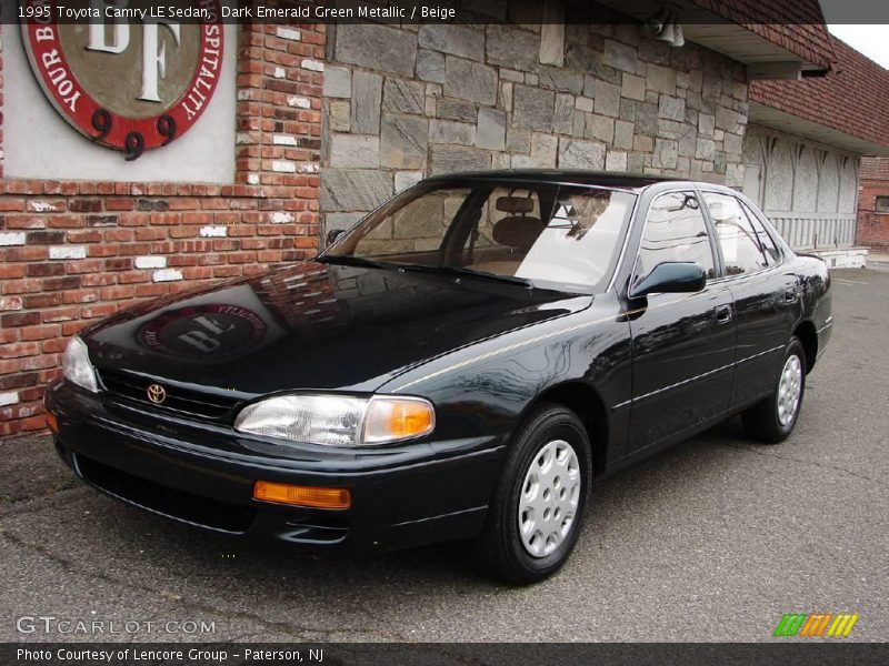 Dark Emerald Green Metallic / Beige 1995 Toyota Camry LE Sedan