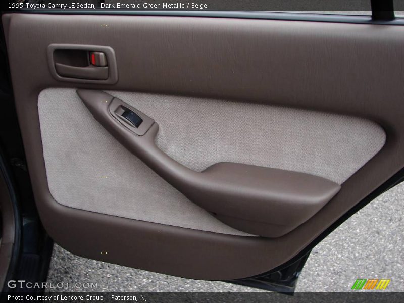 Dark Emerald Green Metallic / Beige 1995 Toyota Camry LE Sedan