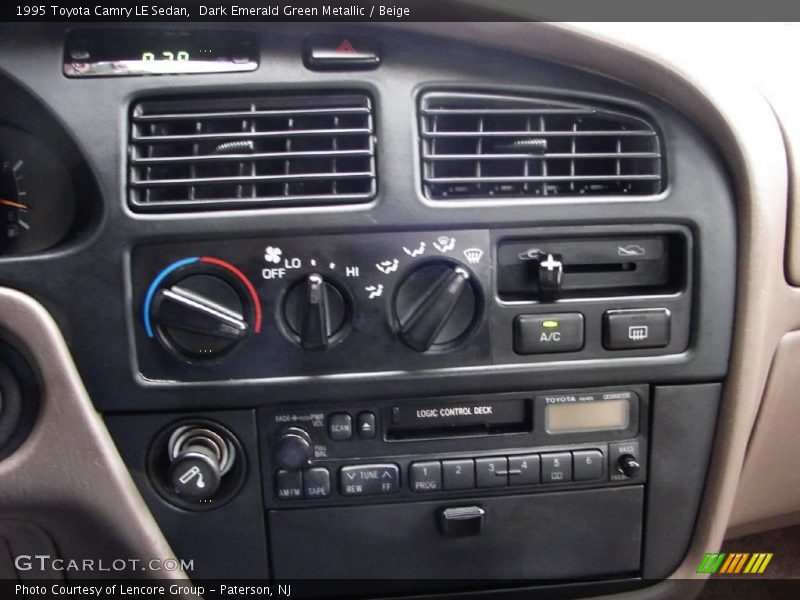 Dark Emerald Green Metallic / Beige 1995 Toyota Camry LE Sedan