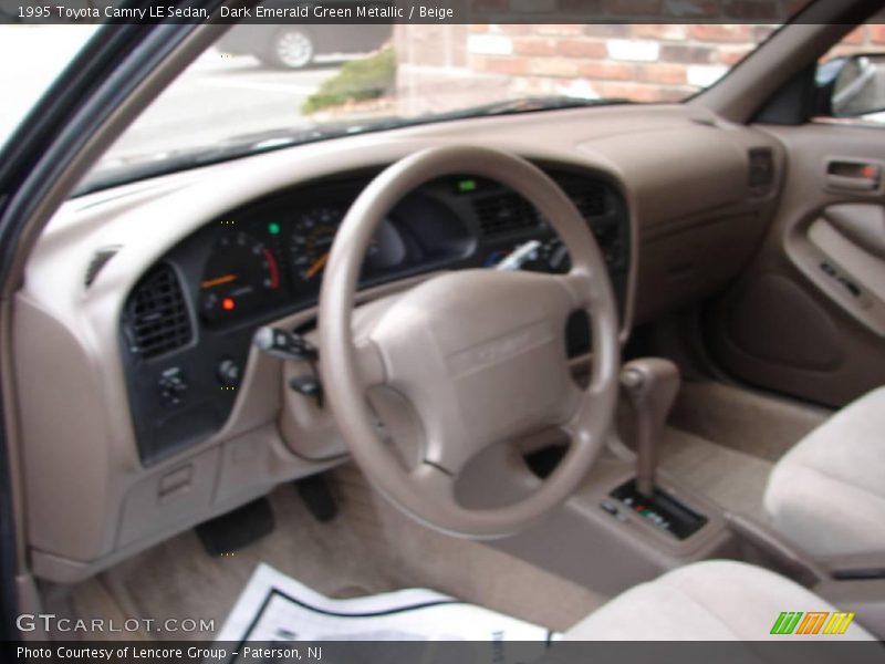 Dark Emerald Green Metallic / Beige 1995 Toyota Camry LE Sedan