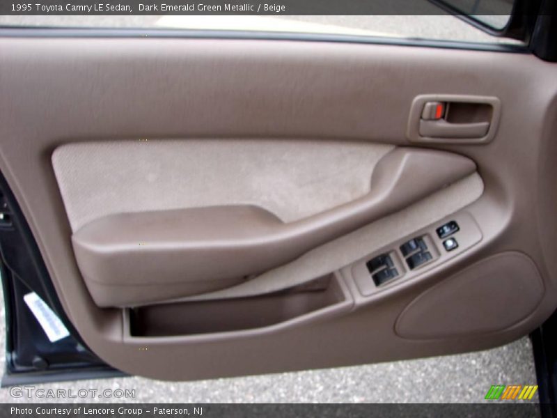 Dark Emerald Green Metallic / Beige 1995 Toyota Camry LE Sedan