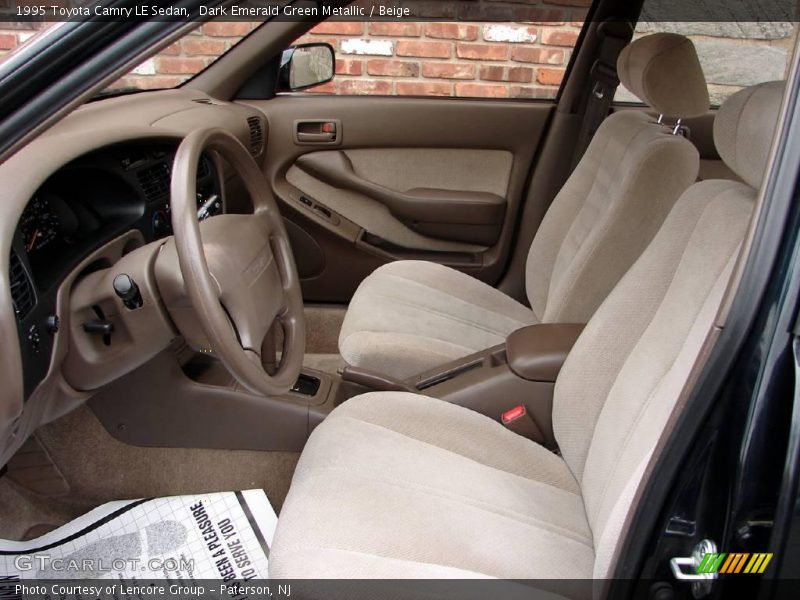 Dark Emerald Green Metallic / Beige 1995 Toyota Camry LE Sedan