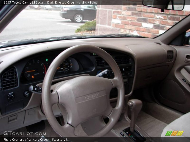 Dark Emerald Green Metallic / Beige 1995 Toyota Camry LE Sedan