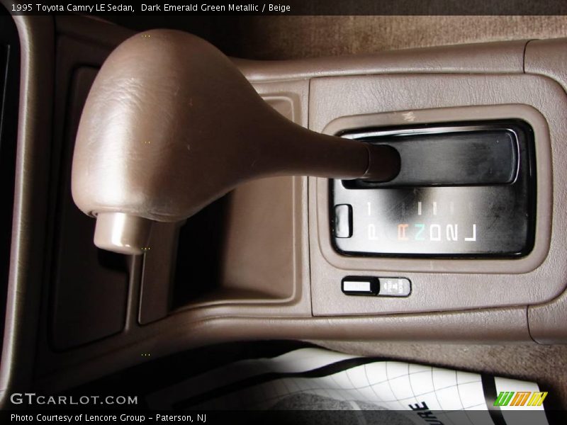 Dark Emerald Green Metallic / Beige 1995 Toyota Camry LE Sedan