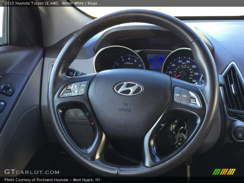 Winter White / Beige 2015 Hyundai Tucson SE AWD