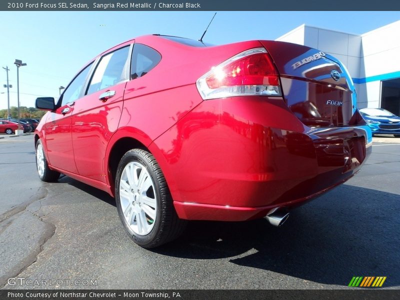 Sangria Red Metallic / Charcoal Black 2010 Ford Focus SEL Sedan