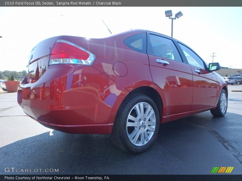 Sangria Red Metallic / Charcoal Black 2010 Ford Focus SEL Sedan