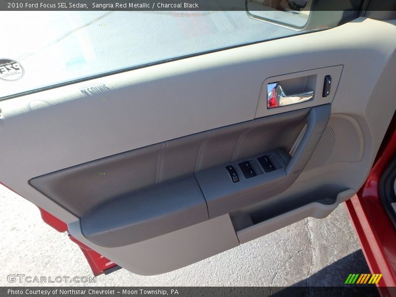 Sangria Red Metallic / Charcoal Black 2010 Ford Focus SEL Sedan