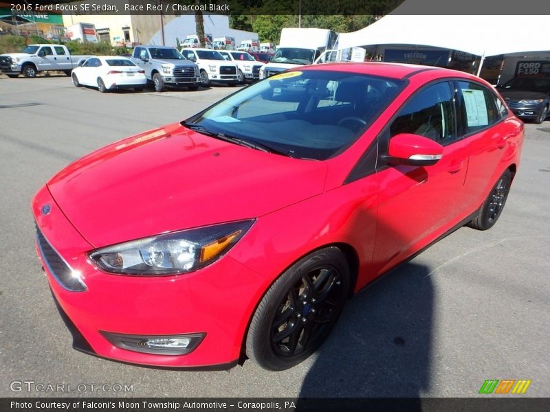 Race Red / Charcoal Black 2016 Ford Focus SE Sedan