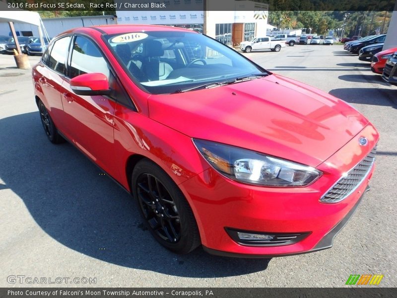 Race Red / Charcoal Black 2016 Ford Focus SE Sedan